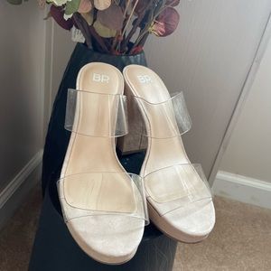 These shoes have been very lightly worn. They are a size 7.